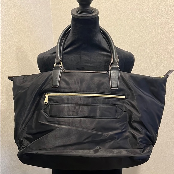 Florence Black Women's travel tote
By 
AIMEE KESTENBERG - Picture 3 of 4